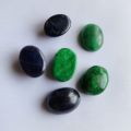 Lot of 3 emeralds and 3 natural sapphires, weighing 50.00 Ct, oval cabochon cut