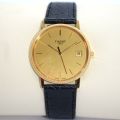 Tissot Herrenuhr aus 18ct Gold, Quarz, mit Gravur "Cercle Munster 20 ans".