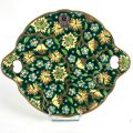 Élégant plat à anses, émaux de Longwy, décor doré sur fond vert
