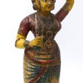 Painted wooden statuette of an Indian woman in a sari
