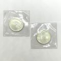 Set of two 200-franc Albert II Millennium coins, 925‰ silver