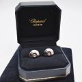 Boucles d'oreilles Chopard Happy Diamonds en or blanc 18 ct avec 2 diamants 0,20 ct