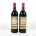 Two bottles of Château Gazin Pomerol, 1985 vintage, low on the neck