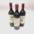 A selection of 3 bottles of Merlot and Tria Corda from Overgaauw Stellenbosch