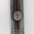 SWATCH SCM 100 : Modèle "CHRONO GOLDFINGER", 1991