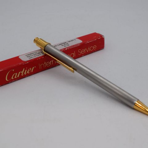 Stylo Cartier avec mine dorée et argent, avec recharge bille bleue