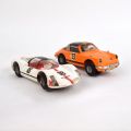 Duo de voitures Märklin : Porsche 911 Targa orange et Carrera 6 blanche