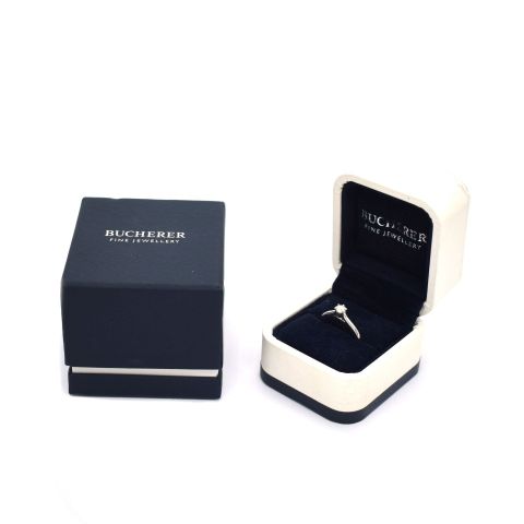 Bague solitaire Bucherer or gris 18K, diamant 0.2ct, taille 53, jamais portée