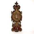 Carved wooden monstrance-reliquary, 18th century, red and gilded
