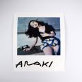 Photographie Polaroid de Nobuyoshi Araki : femme assise, 11 x 9,5 cm