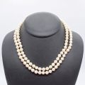 Collier de perles avec fermoir en or 18 ct et diamants 0.24 ct