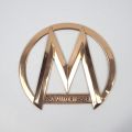 Brass "M S.A automiesse" grille emblem for bus, circa 1950