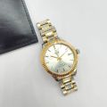 Montre dame Tudor automatique en acier et or 18ct