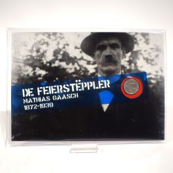Stamp packet and commemorative coin in Plexiglas: De Feirstëppler, Gaasch, 1872-1939
