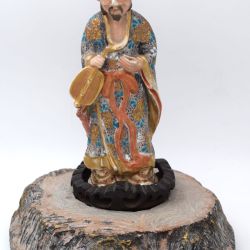 Porcelain figurine of a Japanese man in kimono