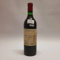 Bouteille de Château Trotanoy 1975, Pomerol, étiquette tachée mais bon niveau