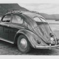 Private photograph of a VW Beetle in front of a lake in 1952 in Luxembourg