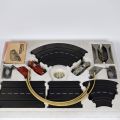 Circuit Marklin complet avec voitures Ferrari et Porsche, télécommandes et accessoires inclus