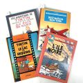 Quatre albums d'Hergé : Jo, Zette et Tintin en éditions variées