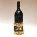 Magnum du Château Haut-Marbuzet 1982 : État étiquette poussiéreuse, niveau goulot