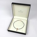 Collier en caoutchouc noir avec pendentif en or 18K, 42cm, 4,27g