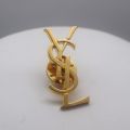 Rare vintage Yves Saint Laurent logo pin, size 3.5 cm