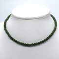 Elegant and refined jade choker necklace with gold-plated clasp