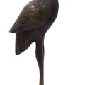 Stork on the shell of a turtle, bronze sculpture