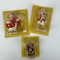 Three resin Asterix figurines: Briseradius, Tullius Destruktivus and Caius Obtus