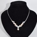 Parure Beaumont & Finet : Collier et bracelet ornés de diamants et perles