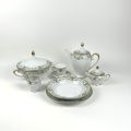 Service en porcelaine Tirschenreuth avec décor floral vert et doré complet