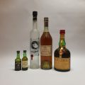 Assortment of 3 bottles of liquor and 2 small bottles of port