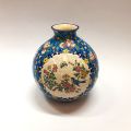 Vase boule en faïence Longwy, décor floral et oiseau, signé Christian Leclercq