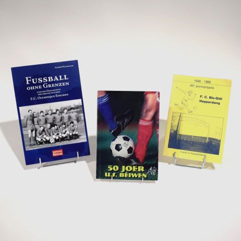 Livres sur les anniversaires des clubs de football : FC Blo-Giél Hepperdang et US Béiwen, ainsi que FC Olympique Eischen