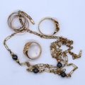 14ct gold jewelry set: 3 rings and a sautoir