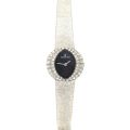 Ladies' watch in 18K white gold, paved with diamonds, elegant black dial