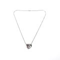 Collier argenté en cœur avec strass par Yves Saint Laurent, 49 cm