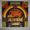 Album vinyle "Super Oldies" comprenant 40 hits originaux en excellent état