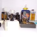 Assortment of ten miniature perfume bottles in perfect condition from leading brands