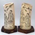 Pair of ivory brush holders with carved sides
