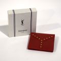 Yves Saint Laurent cardholder in studded red grained leather, box included