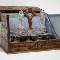 Carved wood liquor cabinet with leaves decoration