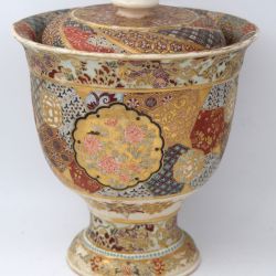 Beautiful covered pot on pedestal in enameled porcelain