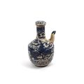 Verseuse en céramique bleue décorée d'un dragon, début XXème, 27 cm