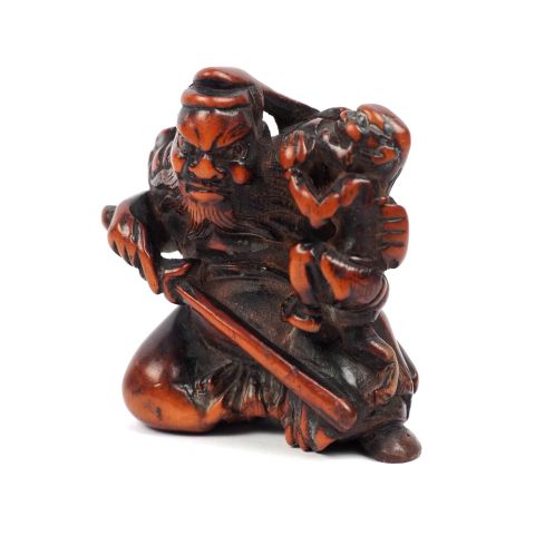 Netsuke Edo en buis : Shoki et l'oni, signé Koremune, XIXe siècle