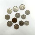 Sammlung von 12 Franc-Münzen, von 1924 bis 1962, zu entdecken