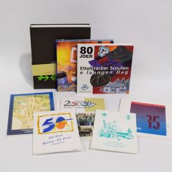 A collection of books on Luxembourg scouting and guiding
