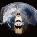 Spectacular view of Atlantis docked to Mir and Earth