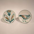 Robert PICAULT (1919-2000) : Ensemble d'assiettes céramiques émaillées, décor oiseau et plante. Signées