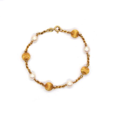 Bracelet en or jaune 18K et perles de culture, élégant et raffiné